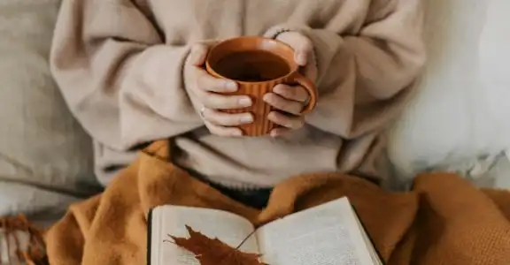 Speedy Services Today Ducted Gas Heating Repair, service Replacement Services with Women enjoying Hot Coco