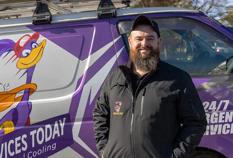 Daniel in front of plumbing van speedy services today Romsey